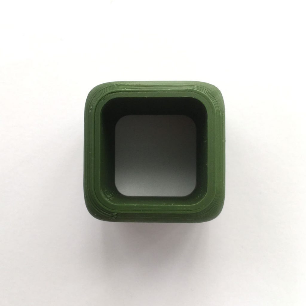 Square green woggle with Scouting Logo